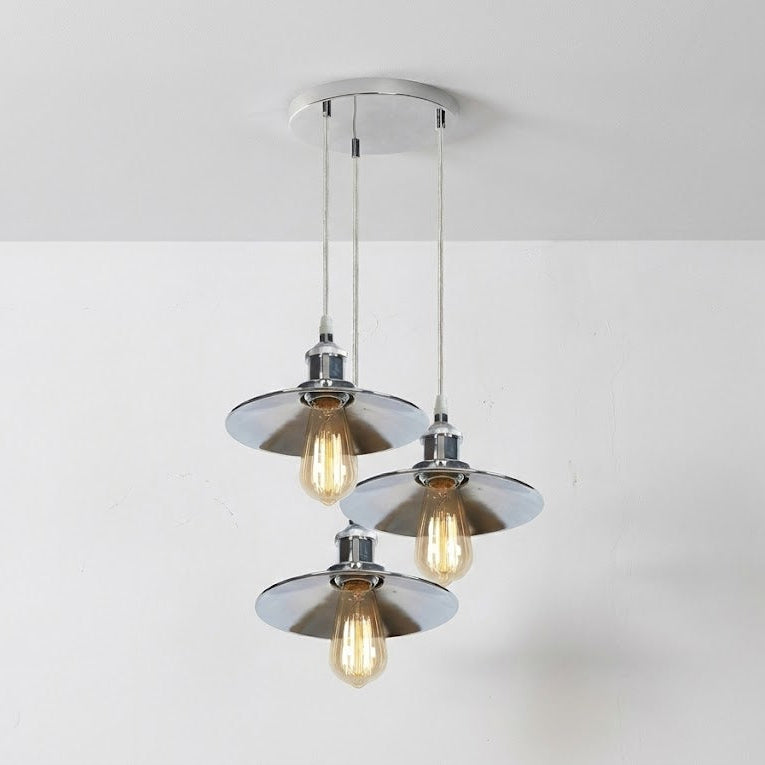 Modern pendant light fixture with three glass shades on a white background