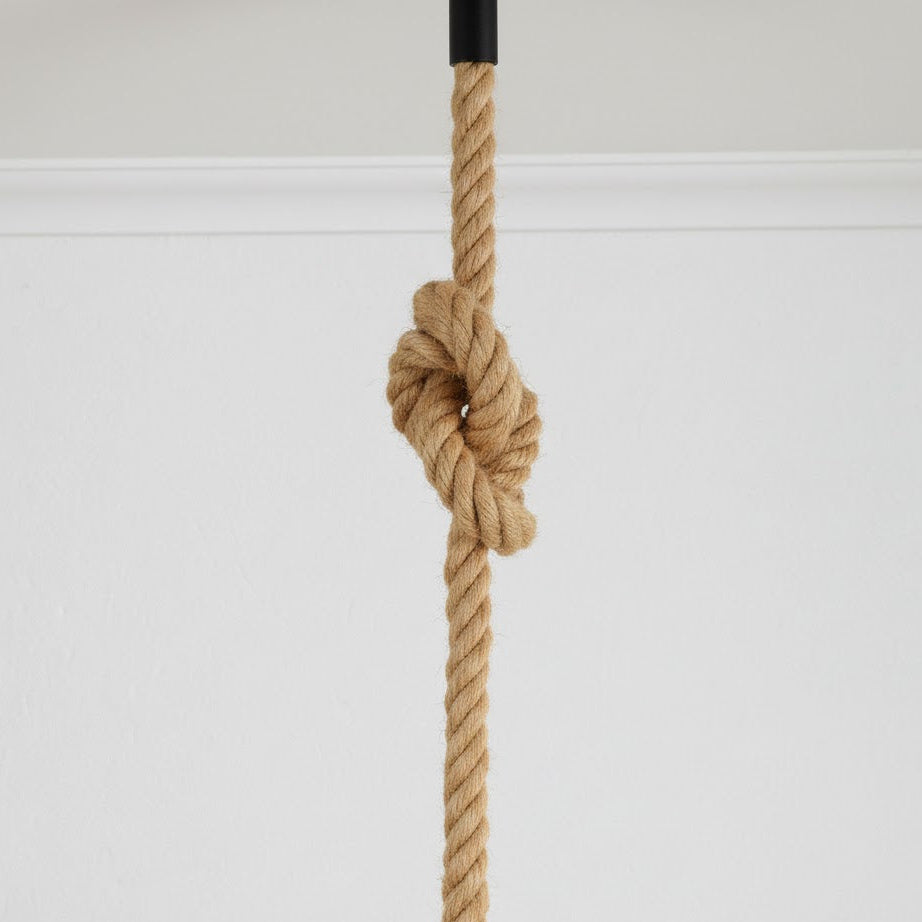 Nautical rope with a knot on a white background