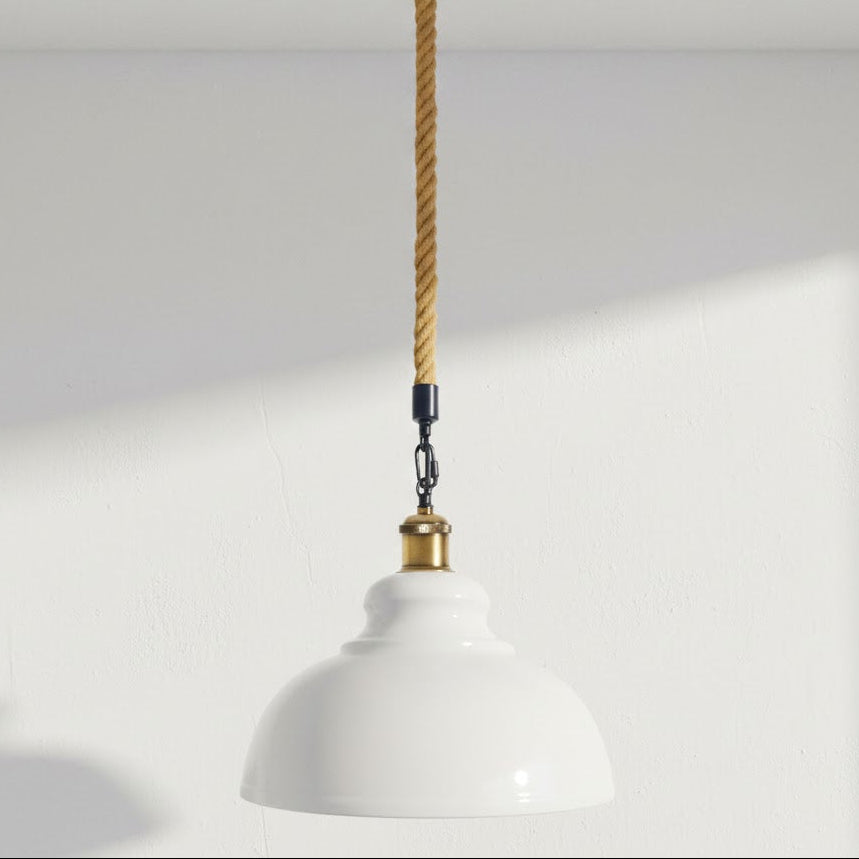 White pendant light with gold accents on a plain background
