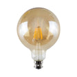 Amber glass light bulb on a white background