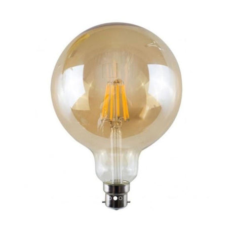 Amber glass light bulb on a white background