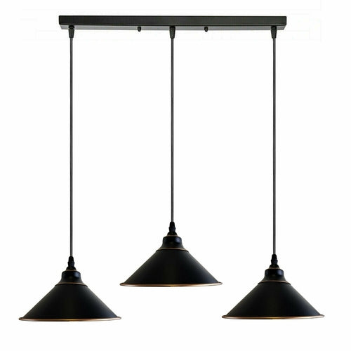 Black pendant light fixture with three hanging lampshades on a white background