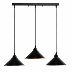 Black pendant light fixture with three hanging lampshades on a white background