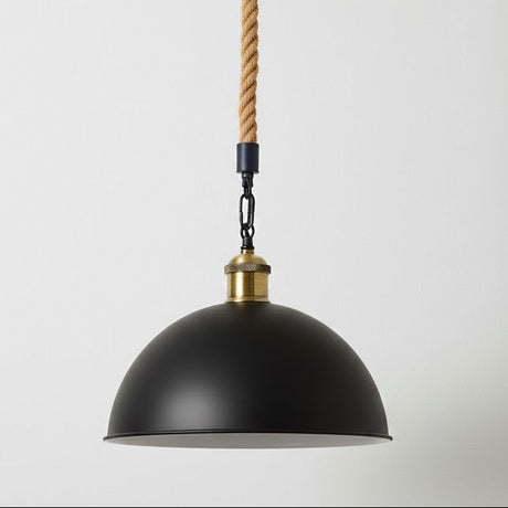 Black pendant light with gold accents and a rope cord on a white background