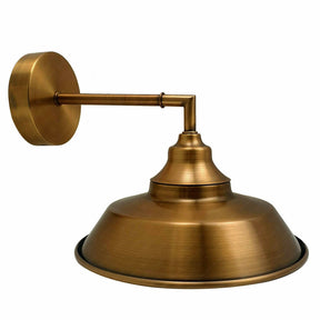 Brass wall-mounted lamp on a white background