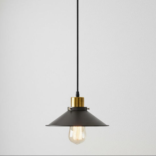 Pendant light with black shade and gold accent on a white background