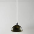 walnut brushed pendant light hanging against a plain background