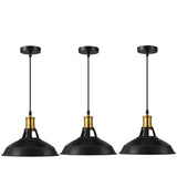 Three black pendant lights with gold accents on a white background