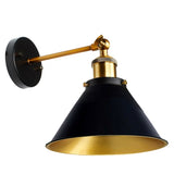 Wall-mounted lamp with black and gold design on a white background