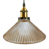 Pendant light with ribbed glass shade on a white background