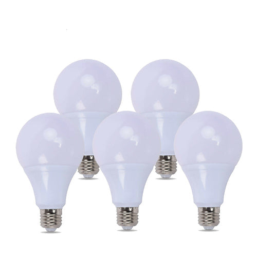 Five white light bulbs with silver bases on a white background


