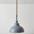 Gray pendant light with a rope cord on a white background