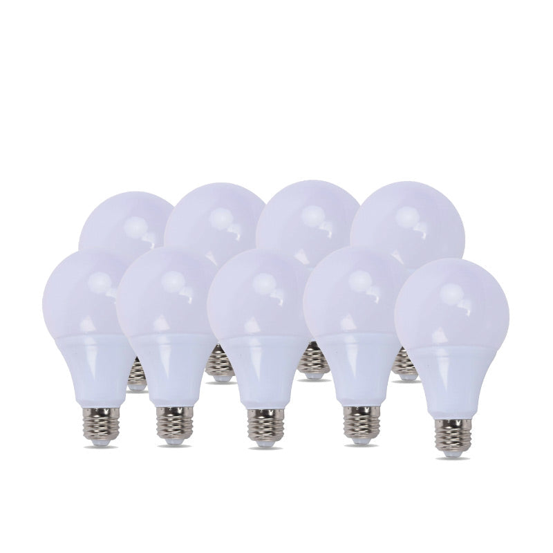 Set of eight white lightbulbs on a white background