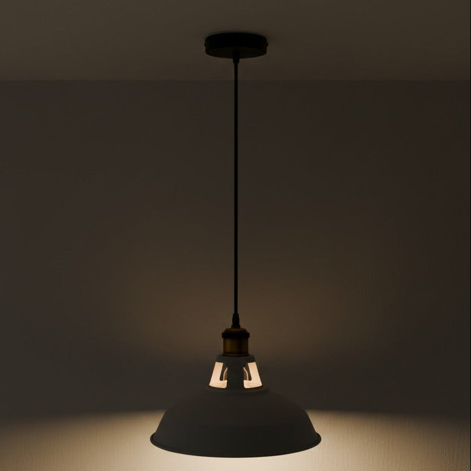 pendant light fixture casting a shadow on a dark background