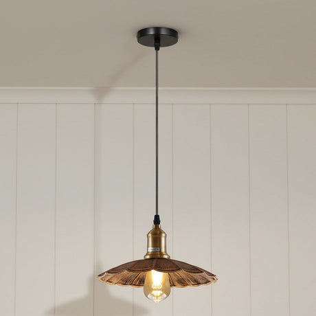 Wooden pendant light hanging from the ceiling with a white paneled wall in the background.