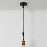 Ceiling light fixture with braided rope design and exposed bulb on a white background