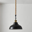 Black pendant light with a rope cord against a plain background