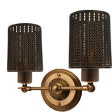 Decorative wall sconce with two lampshades on a white background