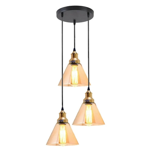 Three pendant lights with glass shades and gold accents on a white background