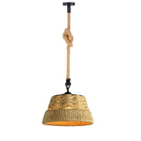 Pendant light with woven design and rope hanging on a white background