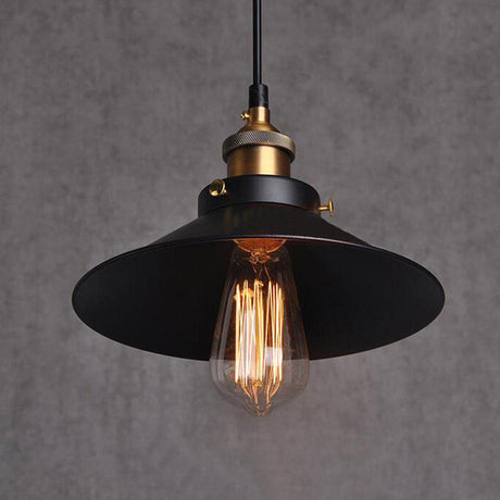 Vintage-style pendant light with black shade and exposed bulb on a gray background