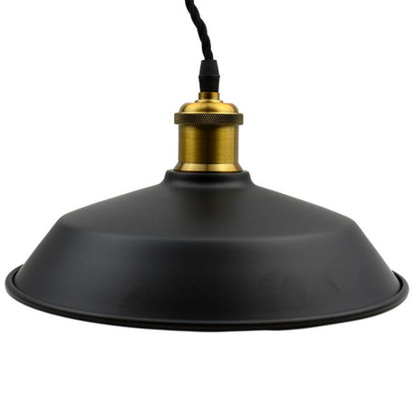 Black pendant light with gold fitting on a white background