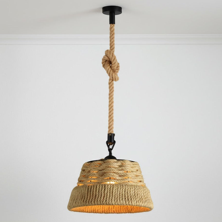 Pendant light with rope design hanging against a white background