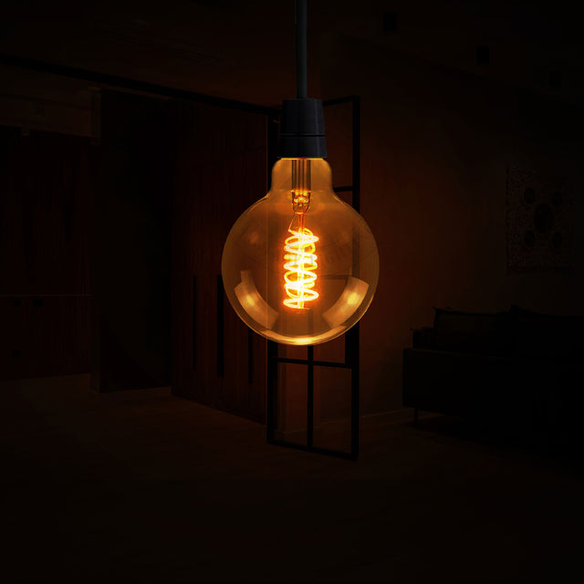 Vintage-style light bulb in a dark room