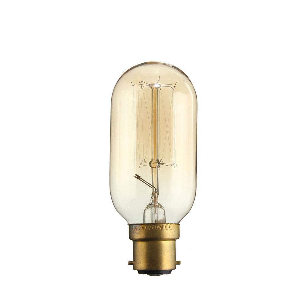 Vintage-style light bulb with a clear glass bulb and brass base on a white background