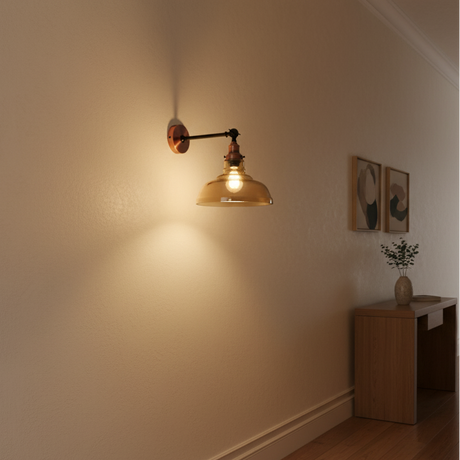 Wall-mounted lamp with a warm glow in a room setting.