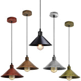 Set of five pendant lights with different colored shades on a white background